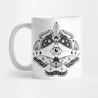 Moth moons and eye Mug